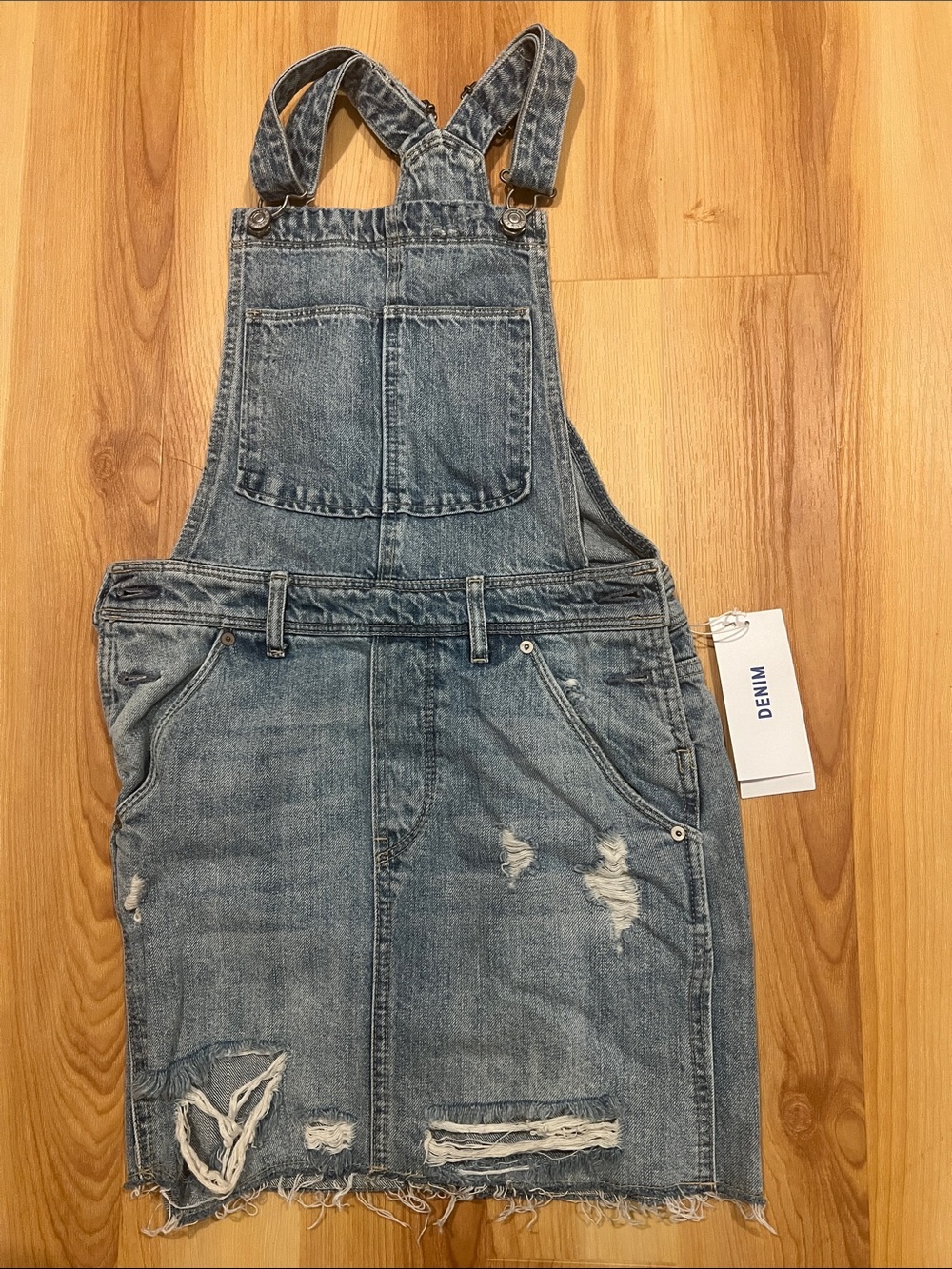 Denim Distressed Mini Overall Dress in Blue